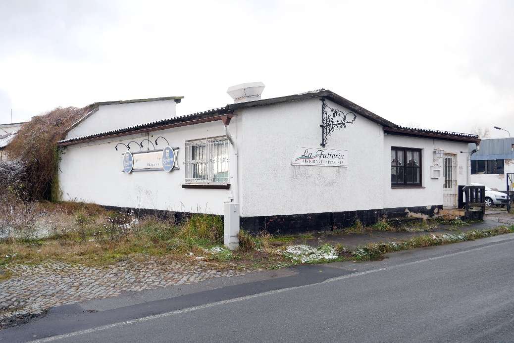 Foto 13 von 14 — Mehrfamilienhaus