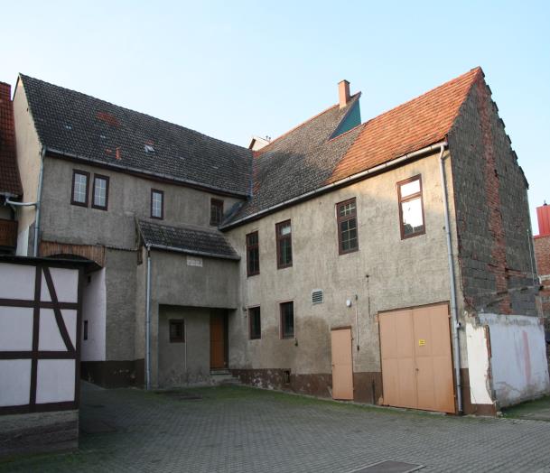 Foto 1 von 9 — Wohn-/Geschäftshaus