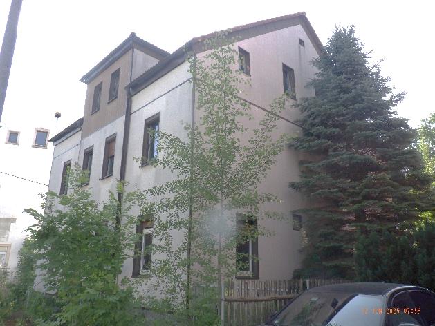 Foto 1 von 34 — Wohn-/Geschäftshaus