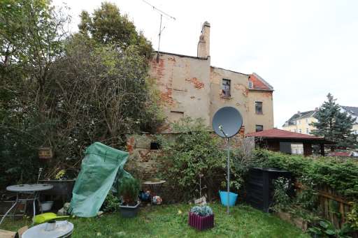 Foto 5 von 7 — Mehrfamilienhaus