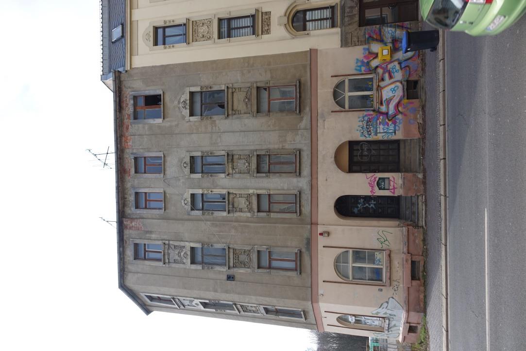 Foto 2 von 14 — Mehrfamilienhaus