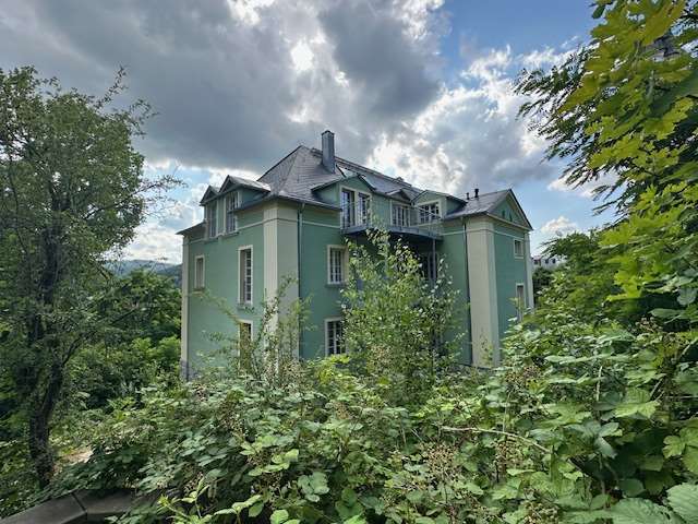 Foto 4 von 4 — Mehrfamilienhaus