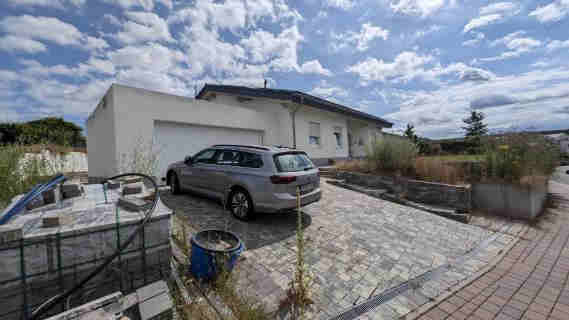 Foto 9 von 25 — Einfamilienhaus, Garage