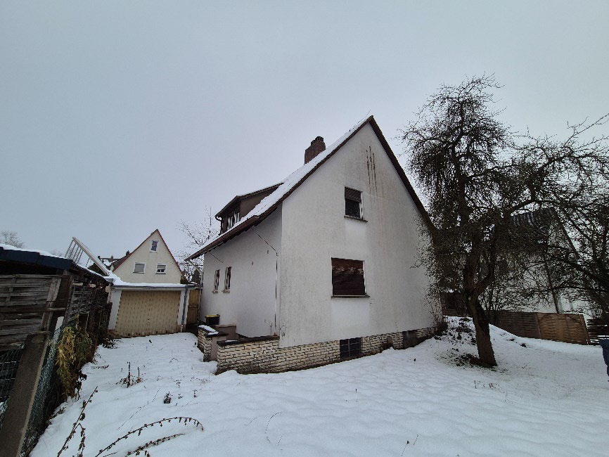 Foto 10 von 13 — Einfamilienhaus, Garage