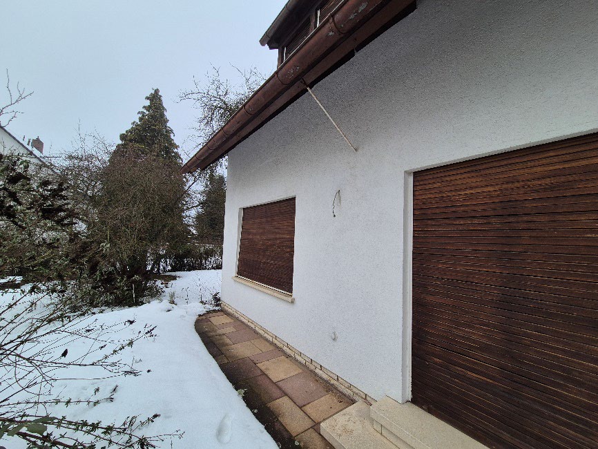 Foto 12 von 13 — Einfamilienhaus, Garage