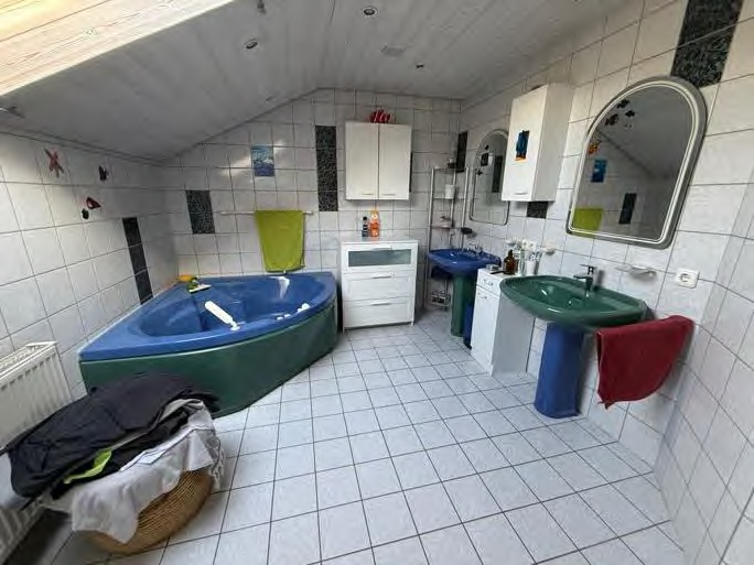 Foto 14 von 32 — Eigentumswohnung (3 bis 4 Zimmer), Garage