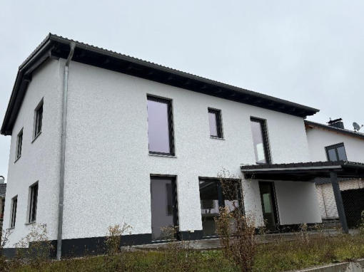 Foto 5 von 28 — Einfamilienhaus, Garage
