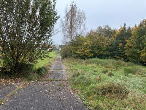 Foto 16 von 18 — Einfamilienhaus, unbebautes Grundstück