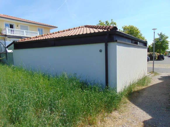 Foto 17 von 20 — Einfamilienhaus, Garage