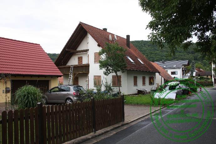 Foto 8 von 12 — Einfamilienhaus, Garage