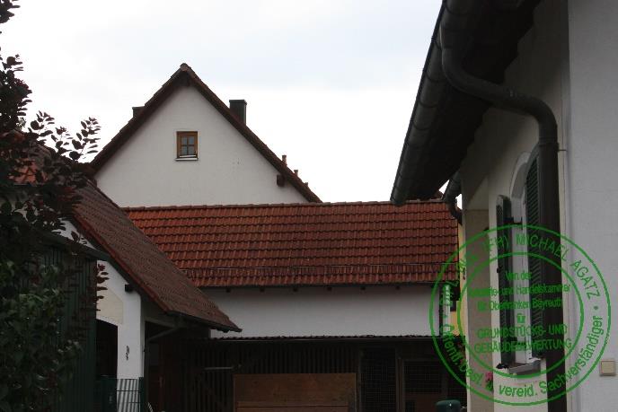 Foto 5 von 12 — Einfamilienhaus, Garage