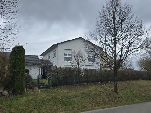 Foto 8 von 19 — Mehrfamilienhaus