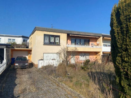 Foto 1 von 3 — Einfamilienhaus, Garage