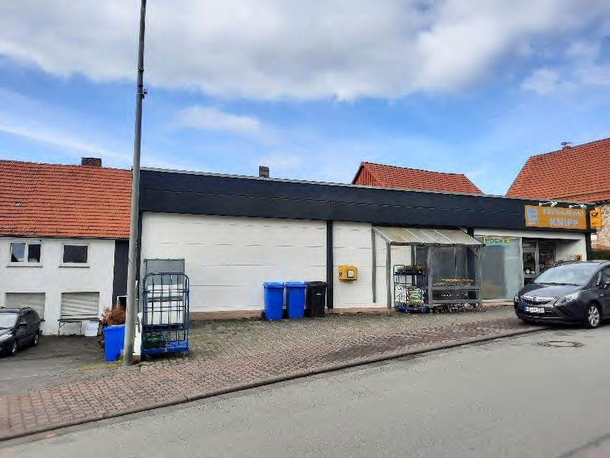 Foto 2 von 2 — Mehrfamilienhaus, gewerblich genutztes Grundstück