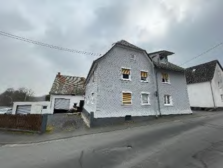 Foto 1 von 39 — Mehrfamilienhaus