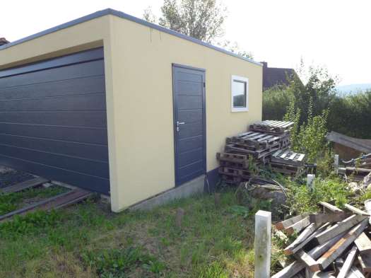 Foto 13 von 15 — Einfamilienhaus, Garage