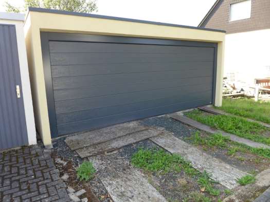 Foto 4 von 15 — Einfamilienhaus, Garage