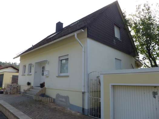 Foto 5 von 15 — Einfamilienhaus, Garage