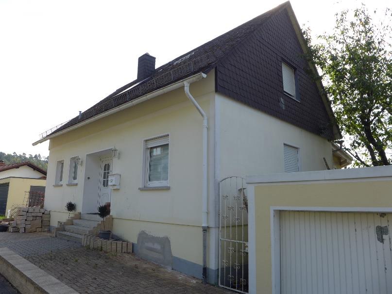 Foto 15 von 15 — Einfamilienhaus, Garage